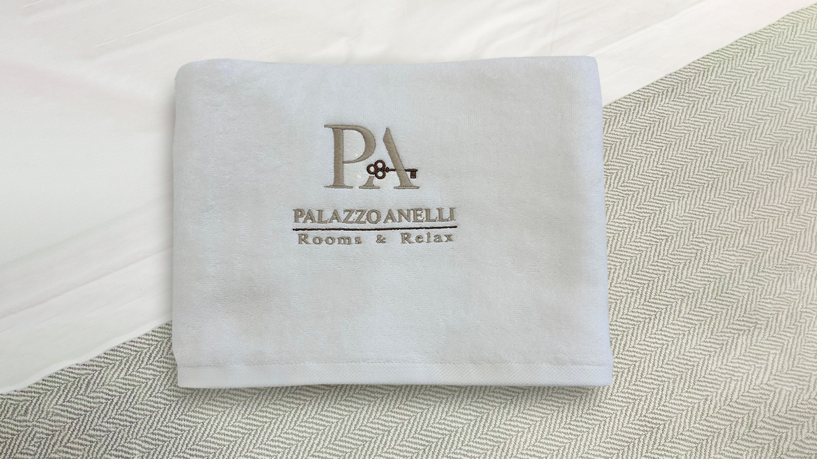 Biancheria Personalizzata con Logo per Palazzo Anelli Room & Relax